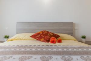 A bed or beds in a room at Cimadolmo Prosecco And History