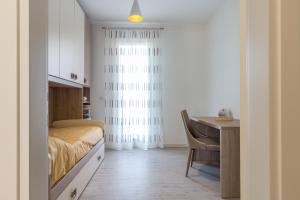 A bed or beds in a room at Cimadolmo Prosecco And History