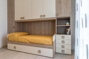 A bed or beds in a room at Cimadolmo Prosecco And History