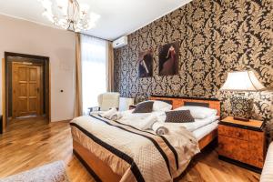 Posteľ alebo postele v izbe v ubytovaní Aparthotel Oberża