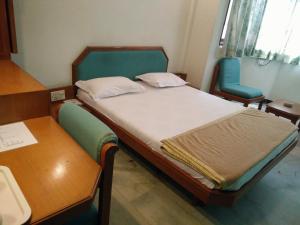 Postel nebo postele na pokoji v ubytování Hotel GRG
