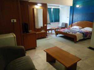 Postel nebo postele na pokoji v ubytování Hotel GRG