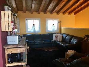 A seating area at B&B CASA mia - camere in appartamento privato -