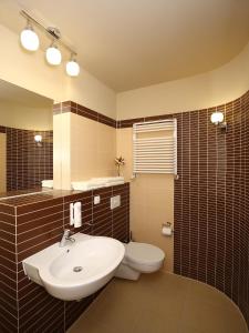 Kúpeľňa v ubytovaní Apartamenty Złota Nić + 37 fotografií
