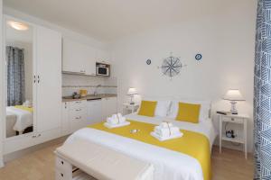 Posteľ alebo postele v izbe v ubytovaní Apartments CenterLink