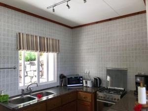 Cucina o angolo cottura di Sailfish Beach Villas
