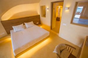 Ένα ή περισσότερα κρεβάτια σε δωμάτιο στο Chic Hotel Santorini