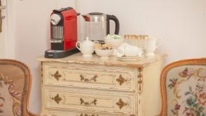 Příslušenství pro přípravu čaje a kávy v ubytování Casa Mia Sittard