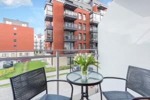 Un balcon sau o terasă la Aura Island Apartments Old Town