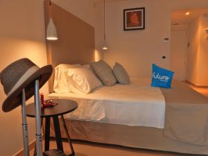 Letto o letti in una camera di Futura Club Spiagge Bianche