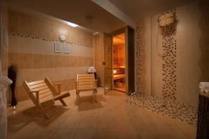 A seating area at Hotel Podhrad