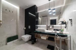 Et badeværelse på Apart-Hotel VIVI RESIDENCE & SPA