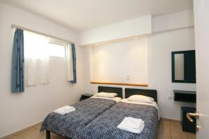 Posteľ alebo postele v izbe v ubytovaní Evropi Hotel