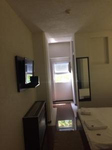 TV a/nebo společenská místnost v ubytování Hotel Millenium2