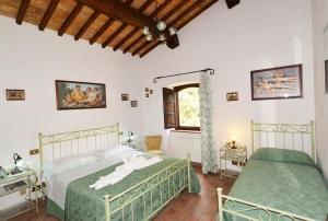 Katil atau katil-katil dalam bilik di Agriturismo Sant'Angelo