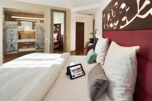 Voodi või voodid majutusasutuse Hotel Scheuble toas