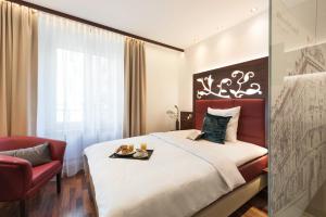 Voodi või voodid majutusasutuse Hotel Scheuble toas