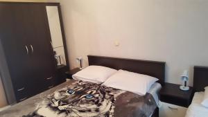 Postel nebo postele na pokoji v ubytování Apartmani Barbara App2