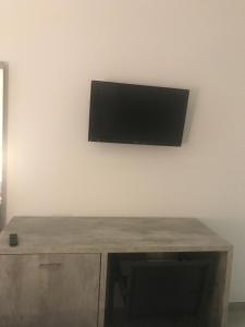 TV a/nebo společenská místnost v ubytování Al Ponte