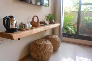 Kohvi ja tee valmistamise võimalus majutusasutuses Jiaoxi Song Tian B&B