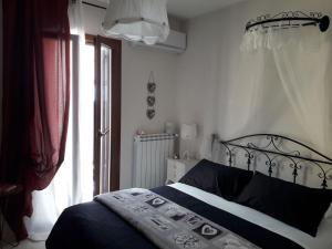 Postel nebo postele na pokoji v ubytování Via Roma 224