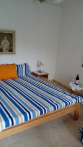 Postel nebo postele na pokoji v ubytování Guest House Roza