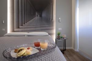 A bed or beds in a room at B&B In Centro Palermo