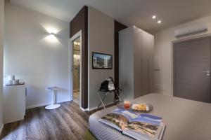 A bed or beds in a room at B&B In Centro Palermo