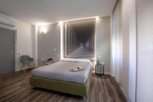 A bed or beds in a room at B&B In Centro Palermo