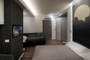 A bed or beds in a room at B&B In Centro Palermo