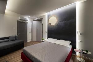 A bed or beds in a room at B&B In Centro Palermo