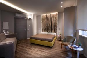 A bed or beds in a room at B&B In Centro Palermo