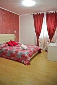 B&B Villa Filomena by Dimorra tesisinde bir odada yatak veya yataklar