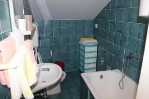 Kúpeľňa v ubytovaní Dudić apartmani + 28 fotografií