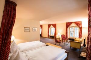 Ein Bett oder Betten in einem Zimmer der Unterkunft Hotel Stadthaus