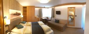 Postel nebo postele na pokoji v ubytování Hotel Talblick