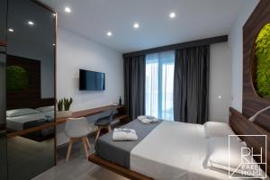A bed or beds in a room at B&B Rakel Home