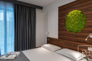 A bed or beds in a room at B&B Rakel Home
