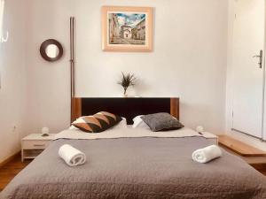 Posteľ alebo postele v izbe v ubytovaní Anamarija apartment