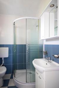 Koupelna v ubytování Apartmani Rakic