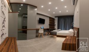 A bed or beds in a room at B&B Rakel Home