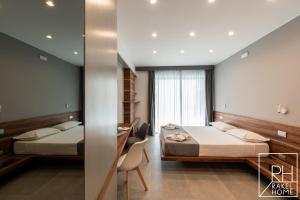 A bed or beds in a room at B&B Rakel Home