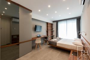 A bed or beds in a room at B&B Rakel Home