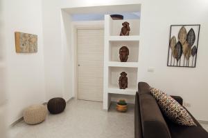 A seating area at Via Vittorio Emanuele Apartment