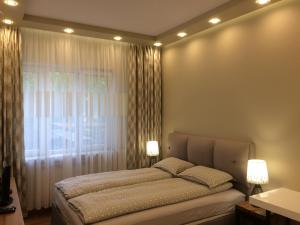 A bed or beds in a room at Light in the heart