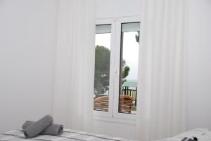Posteľ alebo postele v izbe v ubytovaní New Madrague Beach