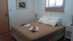 A bed or beds in a room at Casa Di Mare