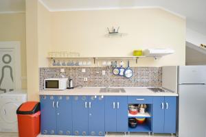 Kuchyň nebo kuchyňský kout v ubytování Hostel Pupa