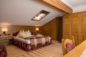 En eller flere senge i et værelse på Ferienwohnung Floriani