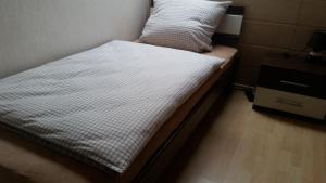 Postel nebo postele na pokoji v ubytování Gästezimmer Langenselbold